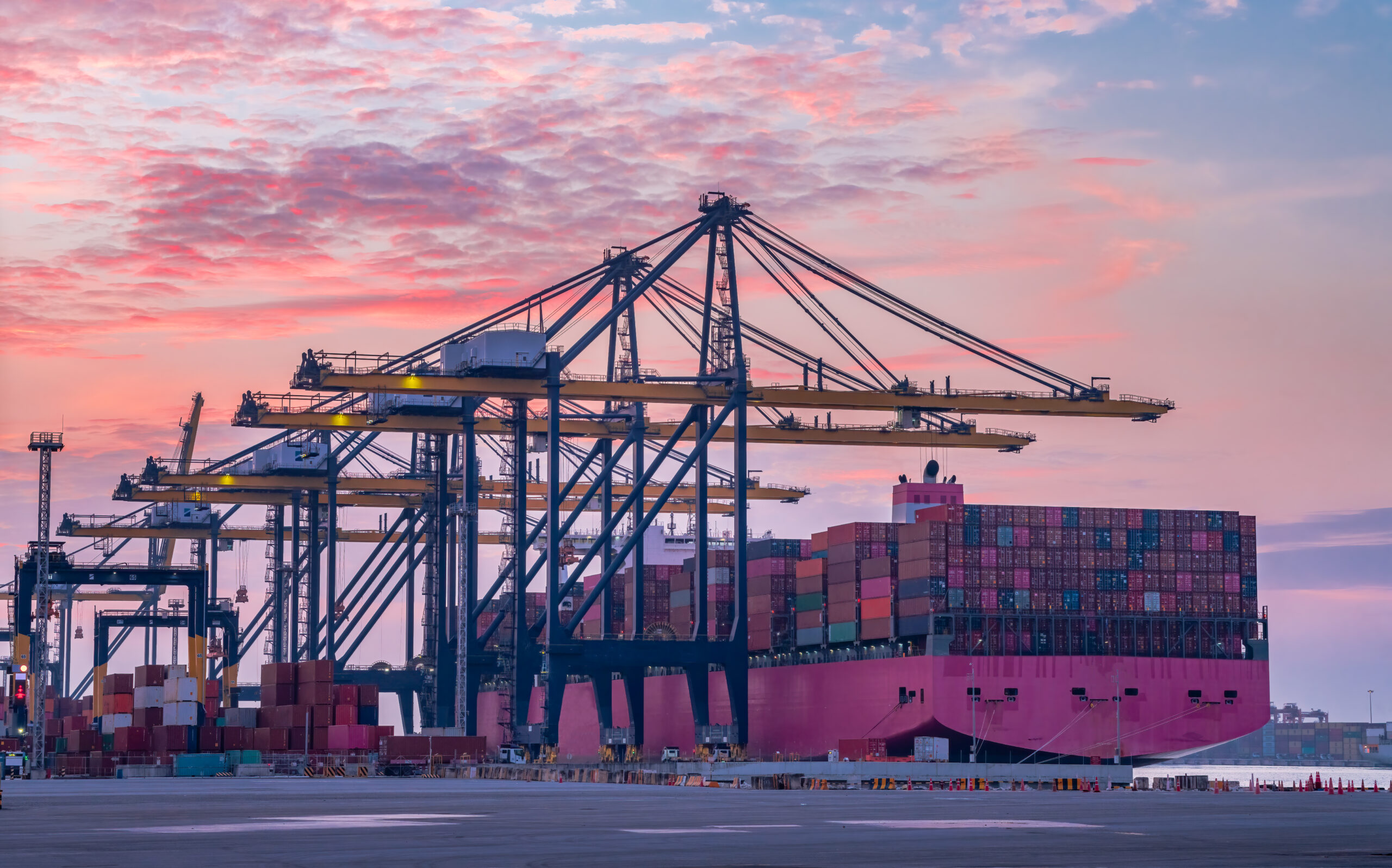 https://elements.envato.com/cargo-ship-and-truck-at-seaport-waiting-for-contai-9VVFKHF